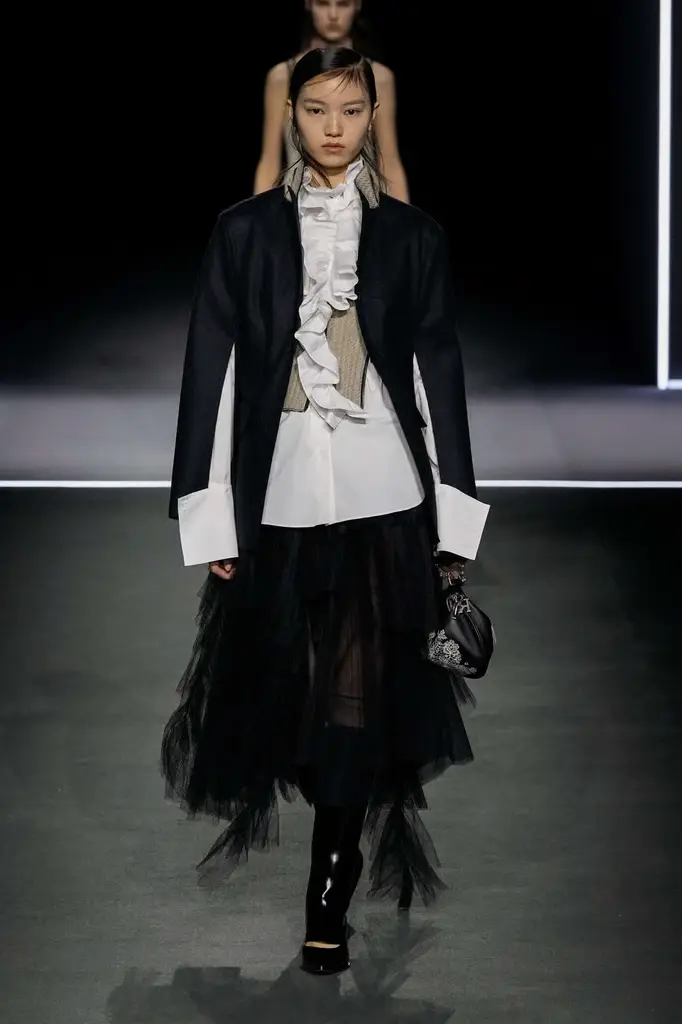 Dior FW25 RTW Brings Theatrical Tailoring to the Tuileries - A Theatrical Beginning - Image 2